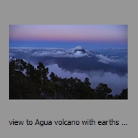 view to Agua volcano with earths shadow at dusk